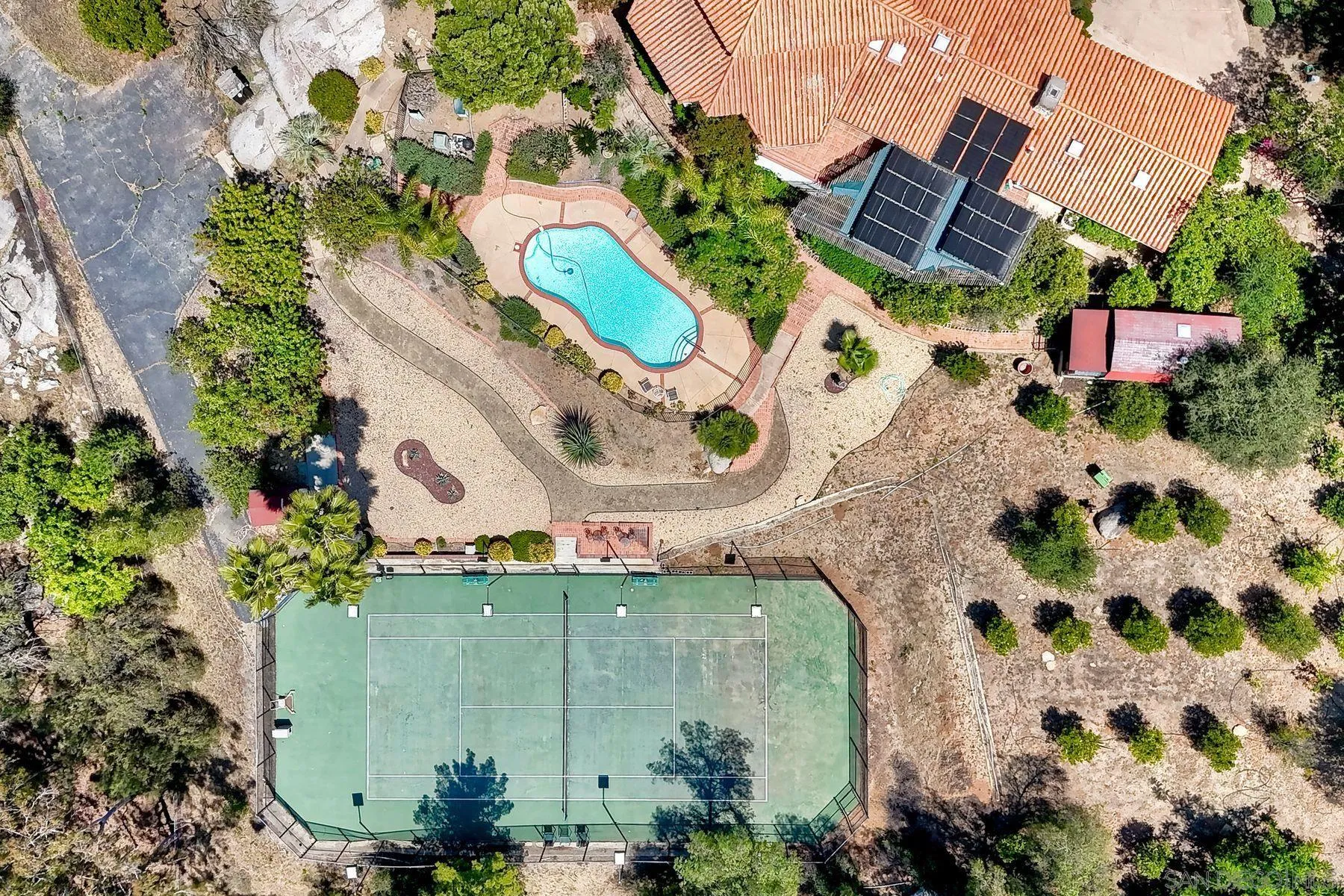 30458 Cool Valley Highlands Road Valley Center, CA 92082 - Photo 14 of 47 an aerial view of a house with a swimming pool
