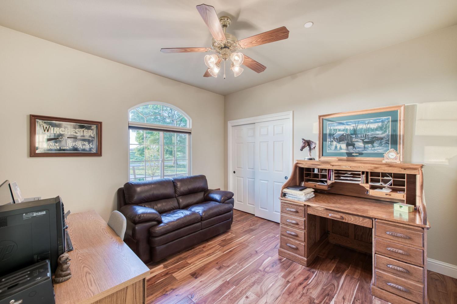 20431 Thermal Road Sanger, CA 93657 - Photo 26 of 88 a living room with furniture and a wooden floor