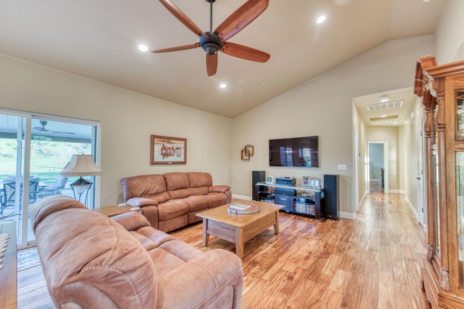 20431 Thermal Road Sanger, CA 93657 - Photo 10 of 88 a living room with furniture and a wooden floor