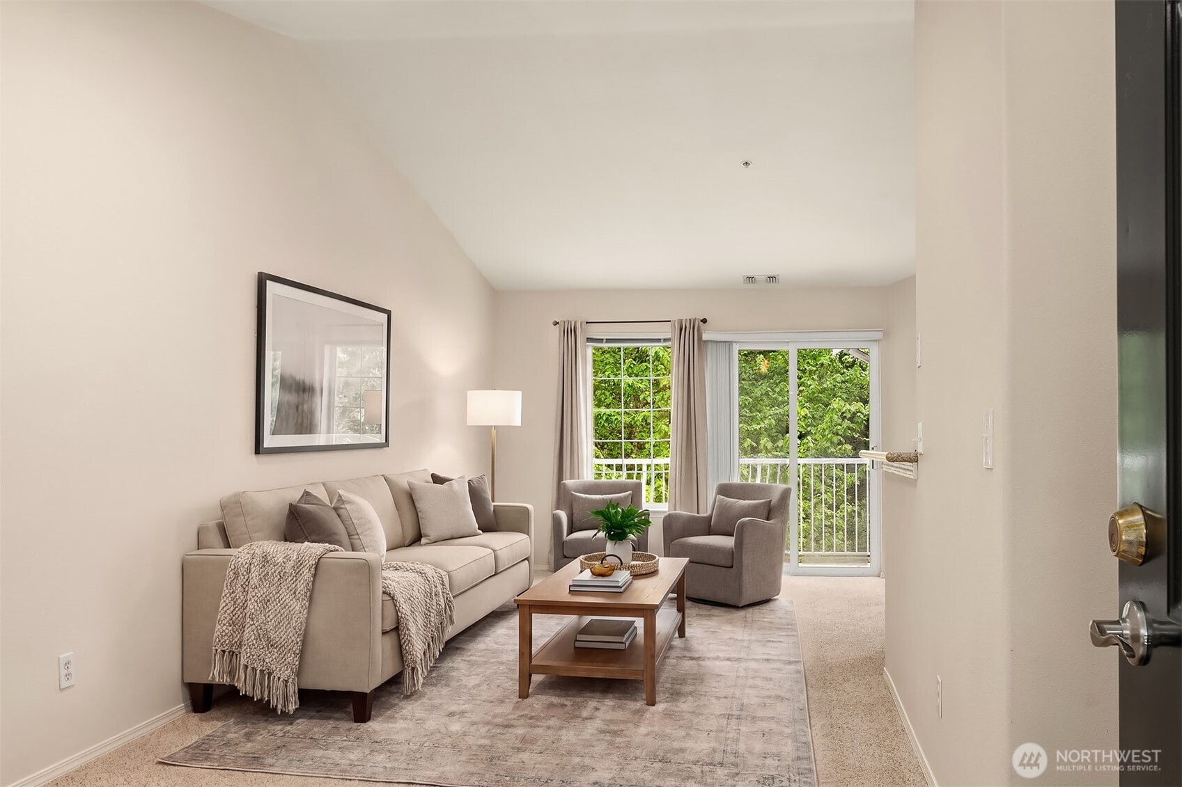 12105 Northeast 171st Place, Unit A302 Bothell, WA 98011 - Photo 2 of 18 a living room with furniture and a large window