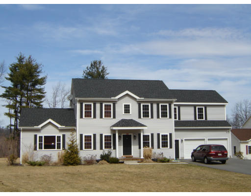 10 Windsor Road Shirley, MA 01464 - Photo 1 of 1 a front view of a house with a yard