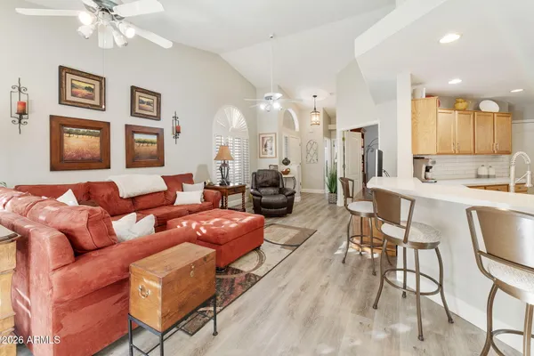 a living room with furniture or couch and a window