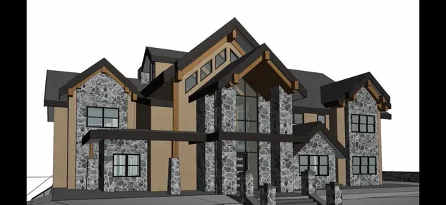 a view of houses with a small yard