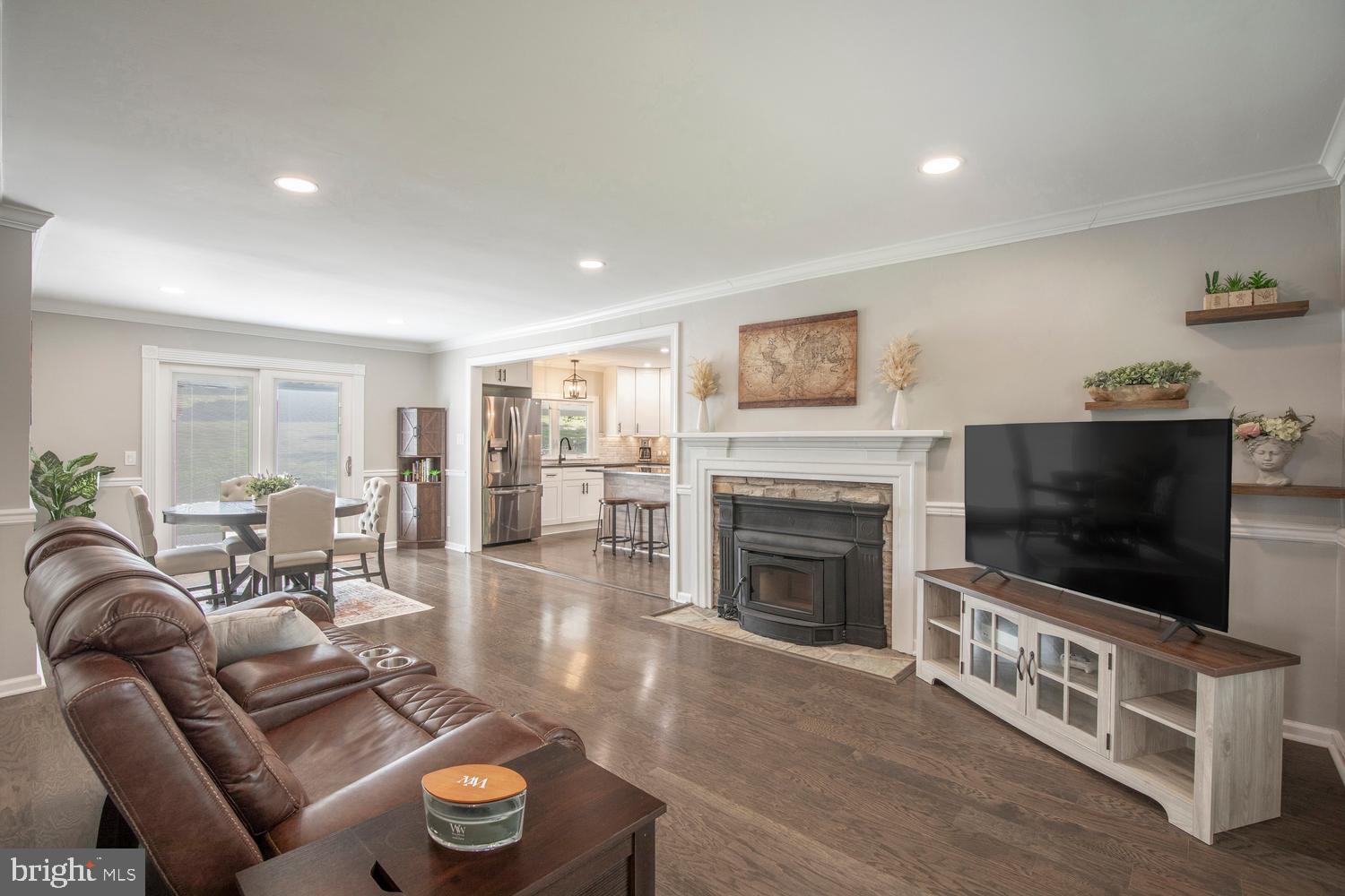 205 Taylorsville Road Yardley, PA 19067 - Photo 7 of 47 Family room with wood burning stove insert