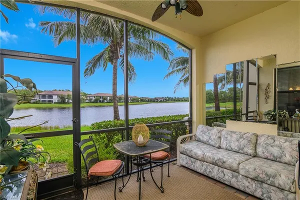 a view of a chairs and table in patio