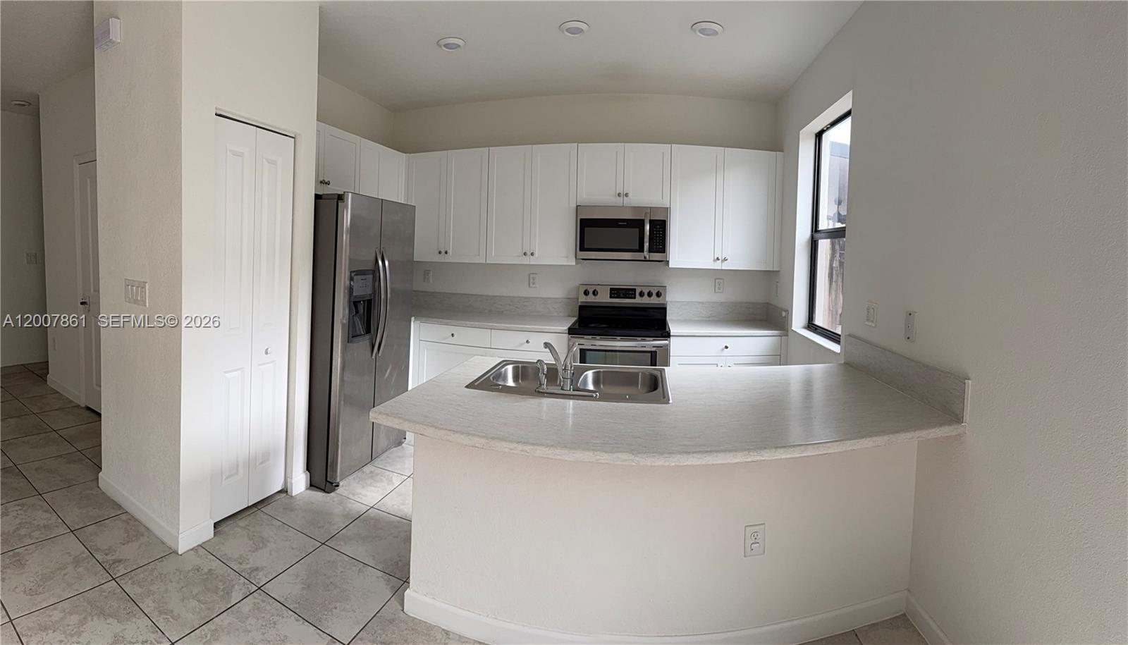 25180 Southwest 114th Court, Unit 10 Homestead, FL 33032 - Photo 1 of 11 Photo 1