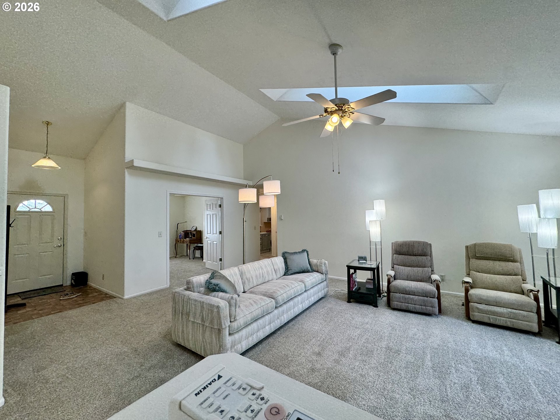 18 Mariners Lane Florence, OR 97439 - Photo 13 of 36 a living room with furniture and a chandelier