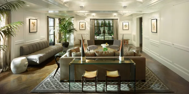 a living room with furniture and a rug