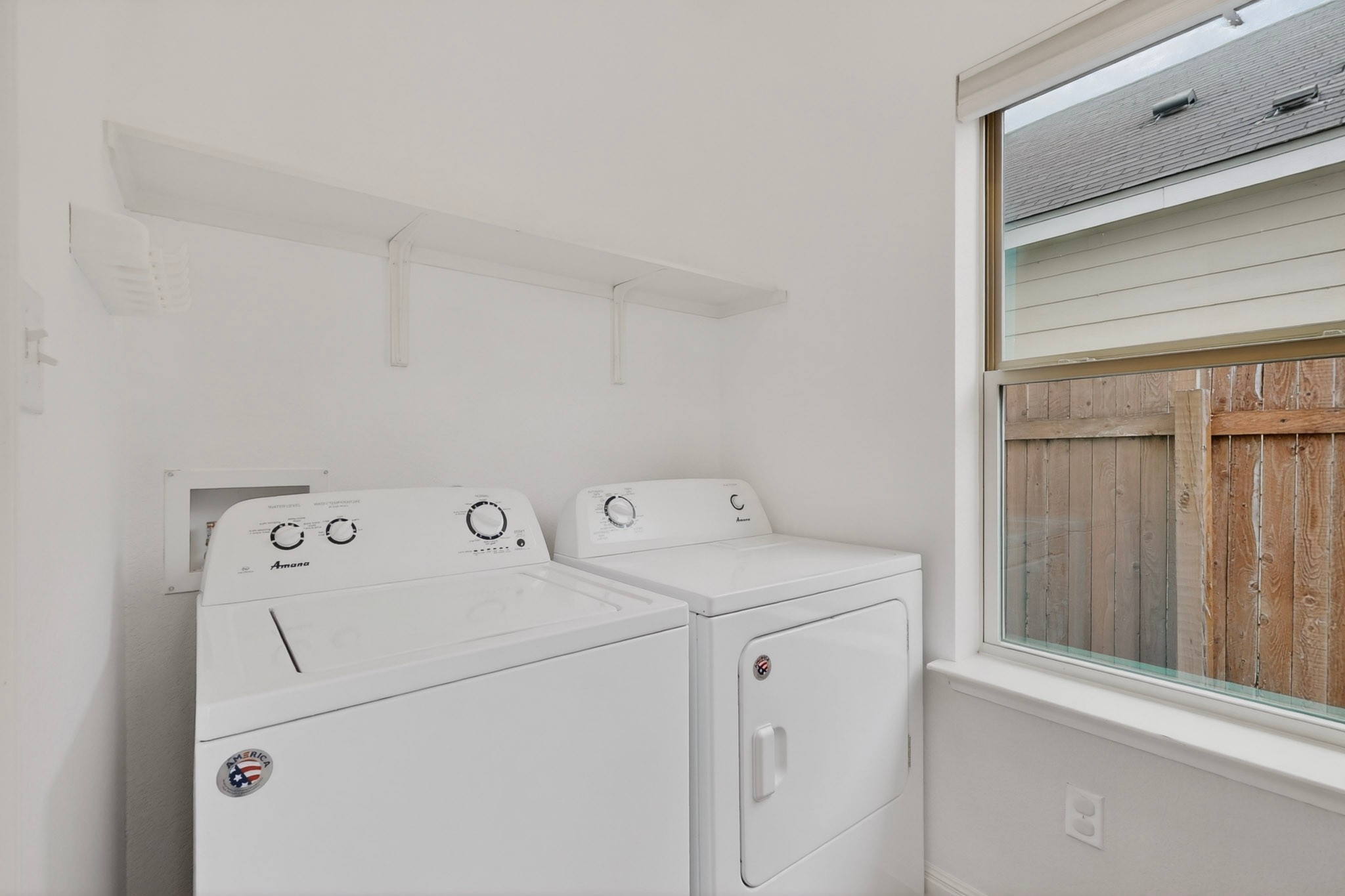 4619 Inicio Lane Austin, TX 78725 - Photo 27 of 32 a utility room with dryer and washer