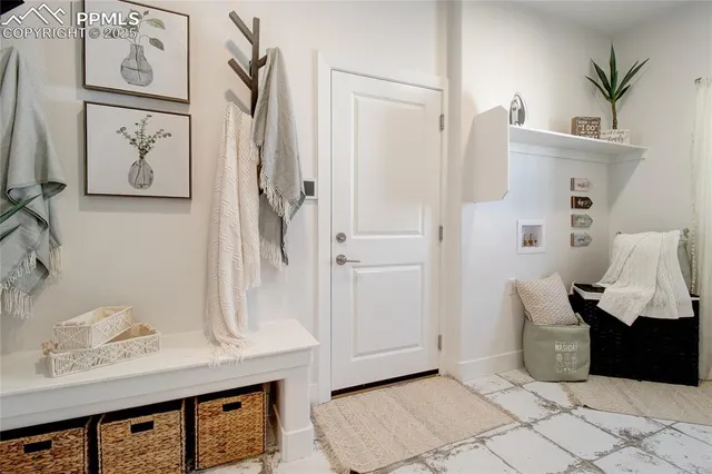 a bathroom with a sink and mirror