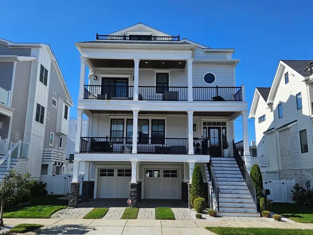 a front view of a building with street view