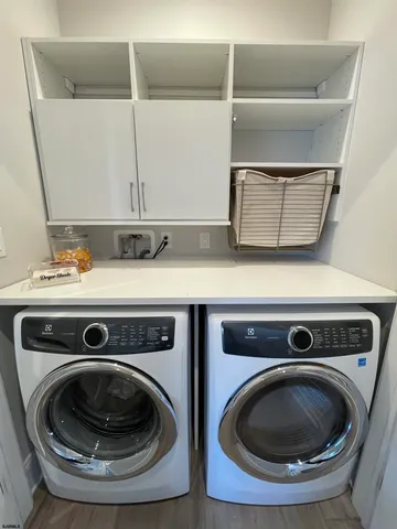 a kitchen with a table and chairs in it
