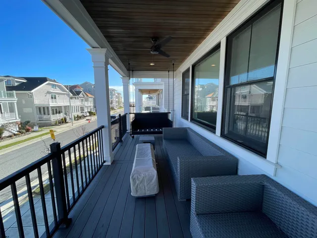 a view of a porch with furniture