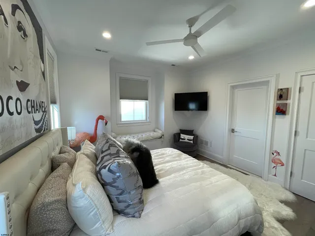a bathroom with a sink a mirror and shower