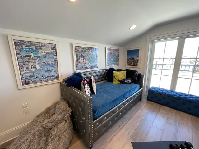 a bedroom with a bed and walk in closet