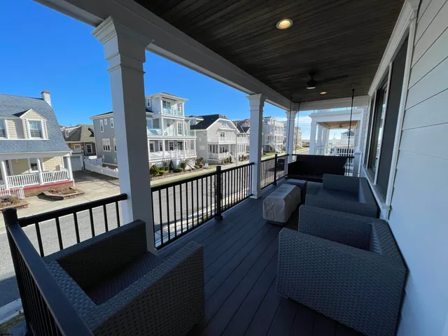 a view of a porch with furniture