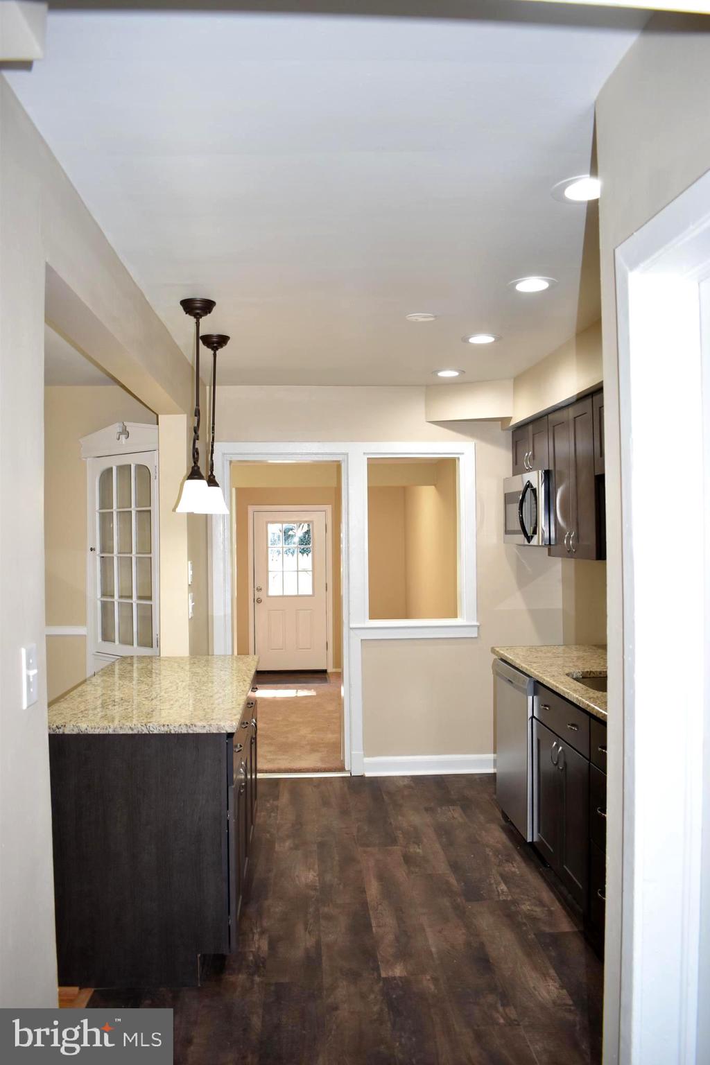 5149 Stafford Road Baltimore, MD 21229 - Photo 13 of 33 Kitchen Opens To Family Room