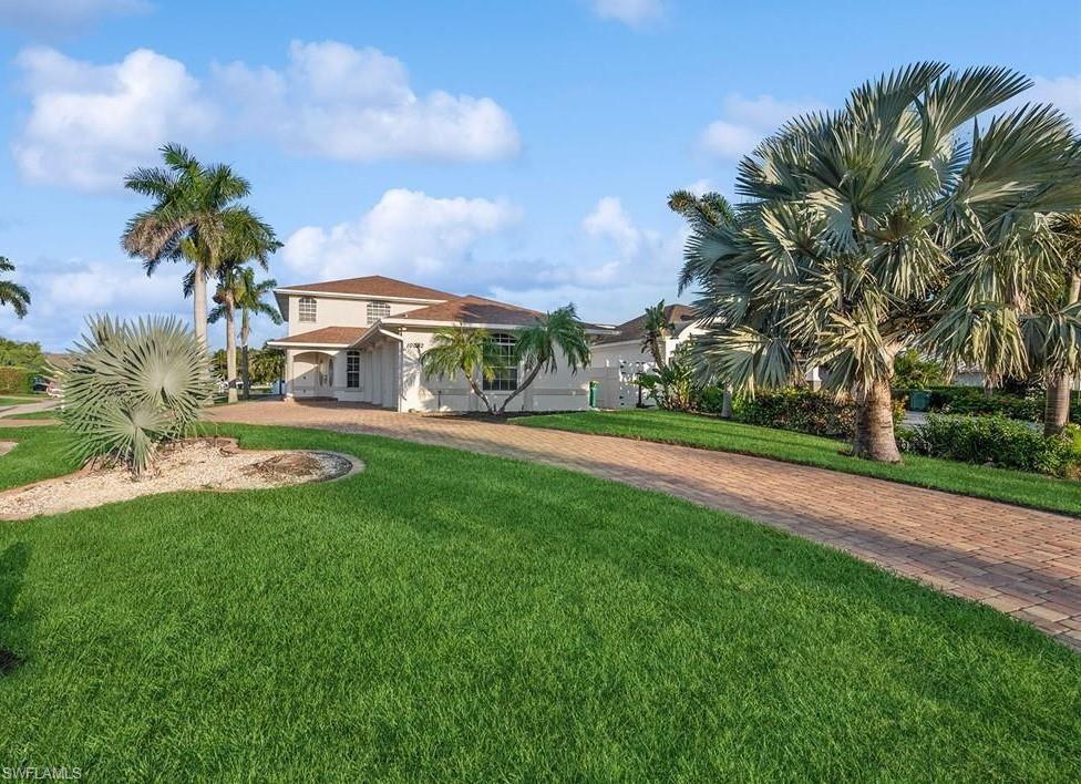 10082 Vanderbilt Drive Naples, FL 34108 - Photo 2 of 43 a view of a park with palm trees