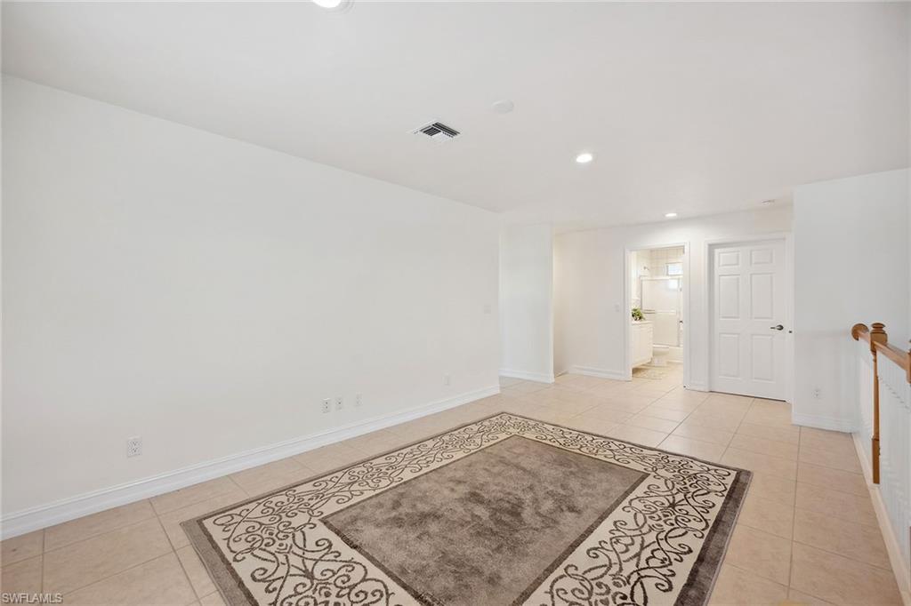 10082 Vanderbilt Drive Naples, FL 34108 - Photo 33 of 43 a view of an empty room