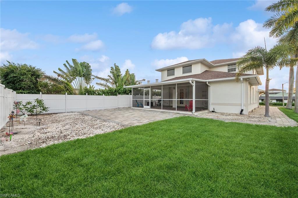 10082 Vanderbilt Drive Naples, FL 34108 - Photo 37 of 43 a view of outdoor space yard and house