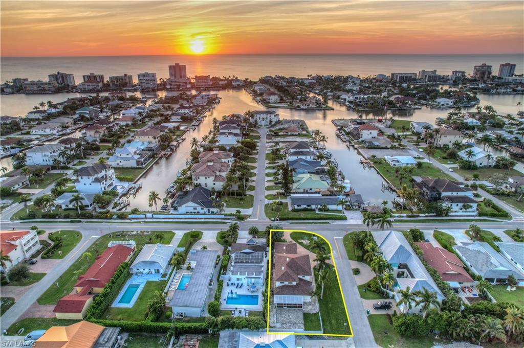 10082 Vanderbilt Drive Naples, FL 34108 - Photo 42 of 43 an aerial view of a city