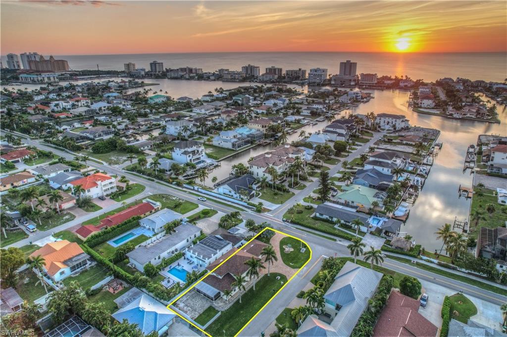 10082 Vanderbilt Drive Naples, FL 34108 - Photo 43 of 43 an aerial view of residential houses with outdoor space