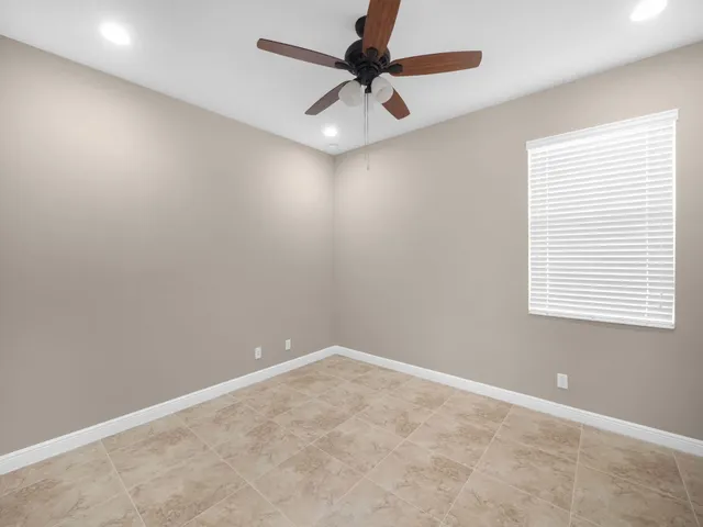 a view of a lake with outdoor seating space and lake view