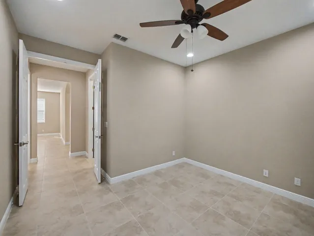 a outdoor view with a sitting space and large windows