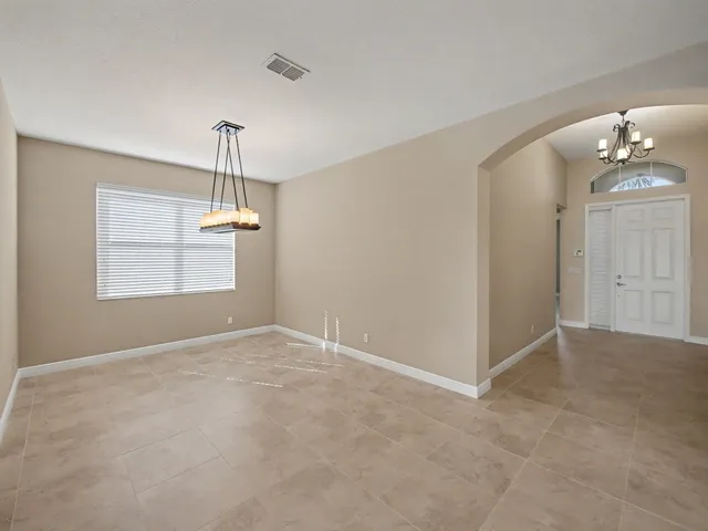 a bathroom with a granite countertop sink mirror and double