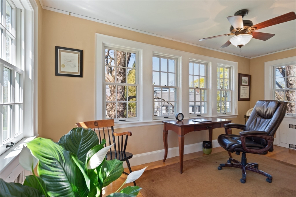 2 Plymouth Road Lexington, MA 02421 - Photo 17 of 38 a living room with furniture and a large window