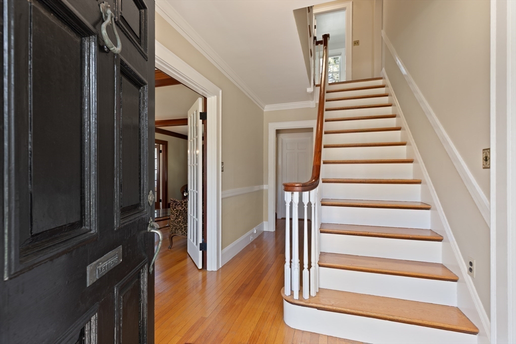 2 Plymouth Road Lexington, MA 02421 - Photo 18 of 38 a view of entryway and hall with wooden floor