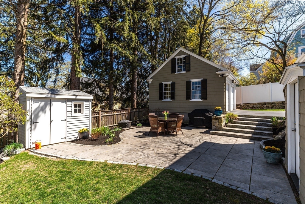 2 Plymouth Road Lexington, MA 02421 - Photo 31 of 38 a view of a house with backyard and sitting area