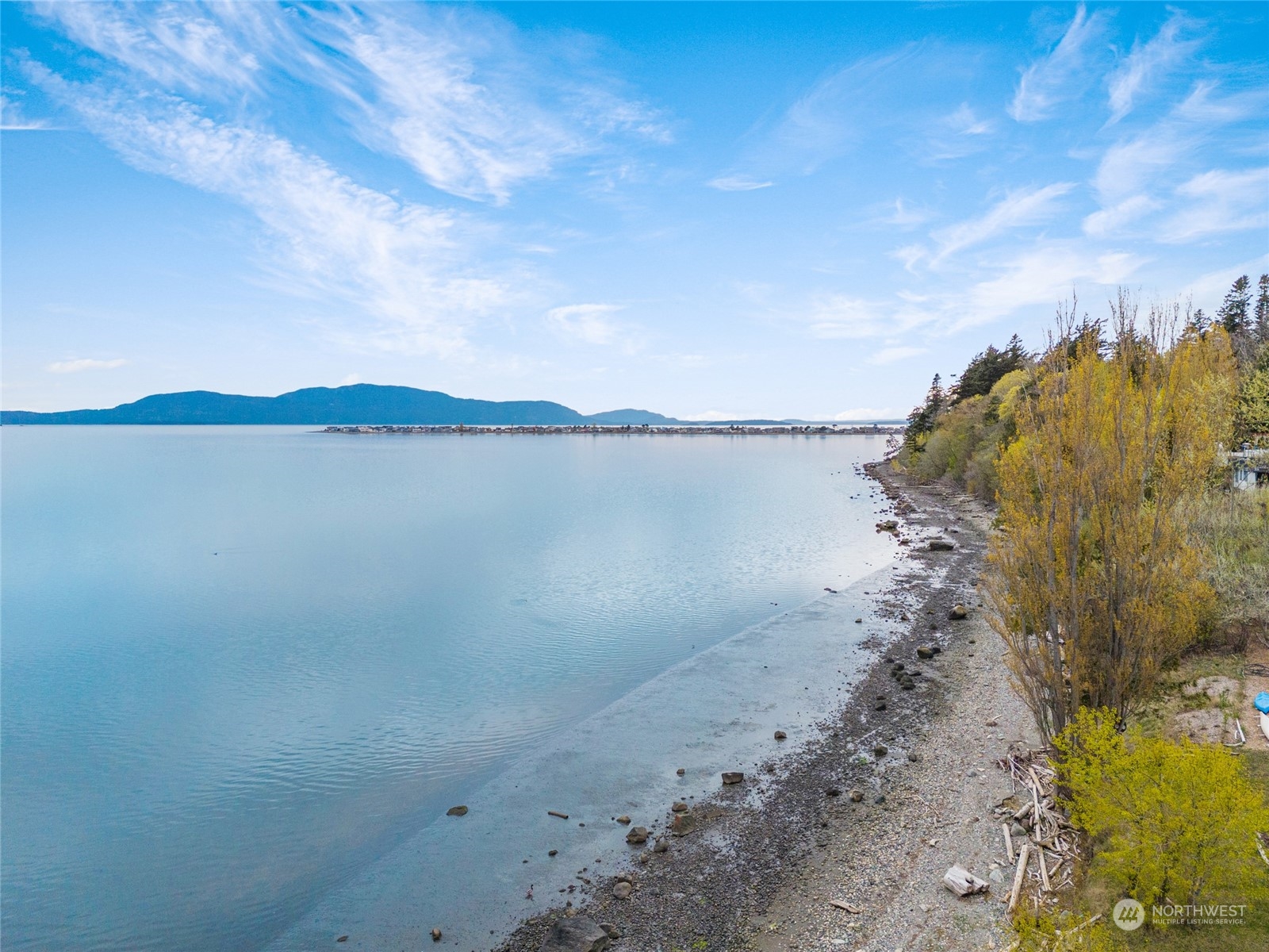 4542 Decatur Drive Ferndale, WA 98248 - Photo 16 of 24 a view of a lake with mountain in the background