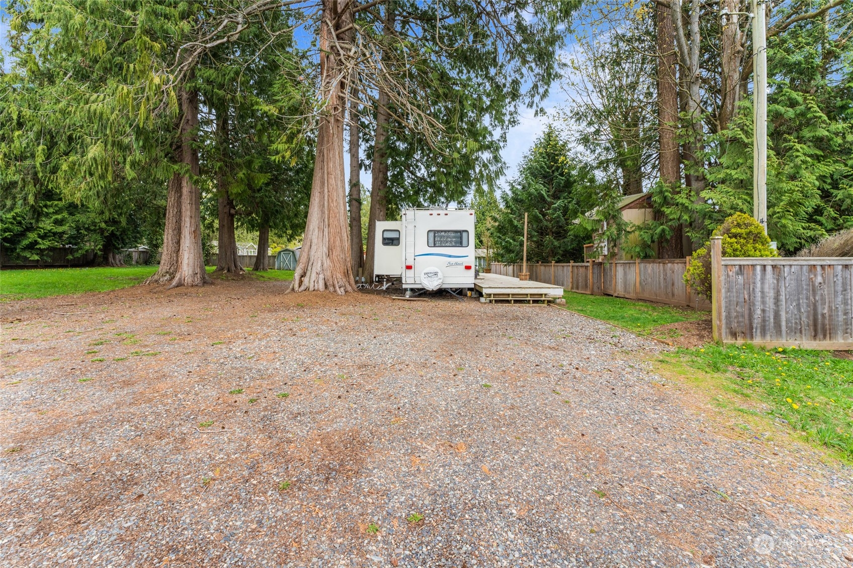 4542 Decatur Drive Ferndale, WA 98248 - Photo 4 of 24 a view of a house with a yard and large trees