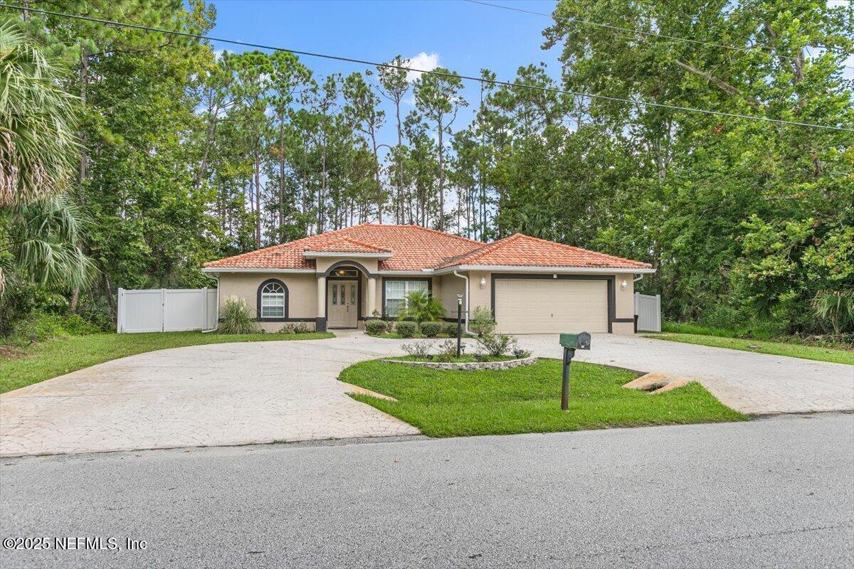 170 Secretary Trail Palm Coast, FL 32164 - Photo 1 of 22 01-Exterior Front