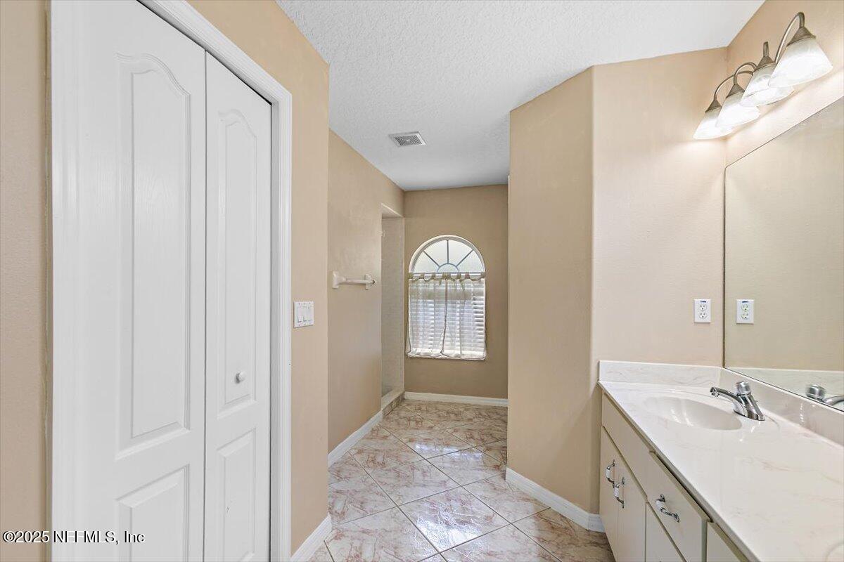 170 Secretary Trail Palm Coast, FL 32164 - Photo 13 of 22 16-Primary Bathroom