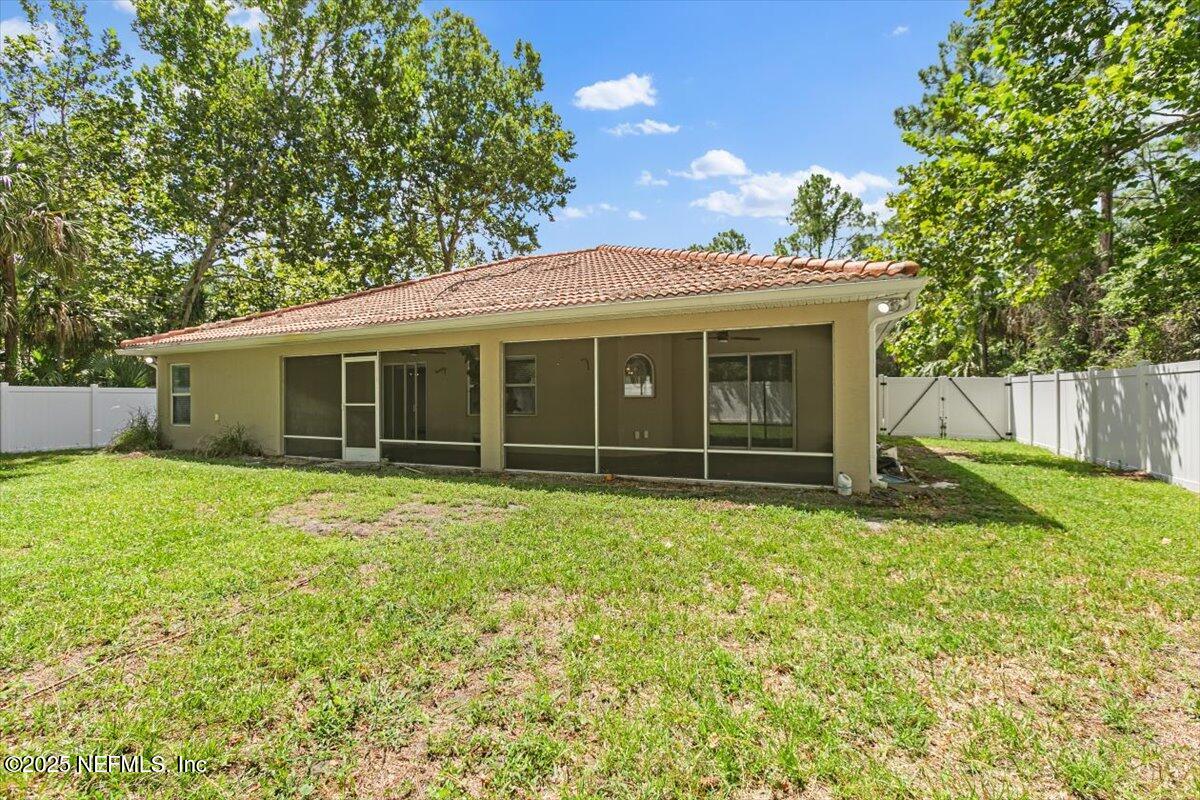 170 Secretary Trail Palm Coast, FL 32164 - Photo 19 of 22 24-Exterior Back