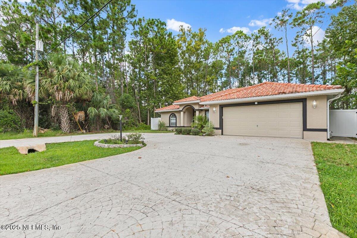 170 Secretary Trail Palm Coast, FL 32164 - Photo 22 of 22 27-Exterior Front