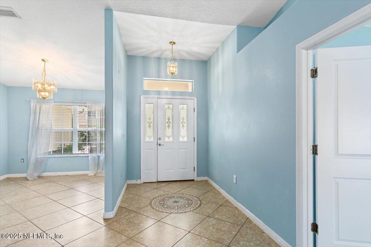 170 Secretary Trail Palm Coast, FL 32164 - Photo 3 of 22 03-Foyer
