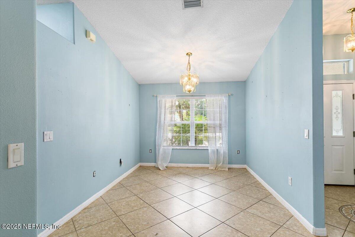 170 Secretary Trail Palm Coast, FL 32164 - Photo 4 of 22 04-Dining Room