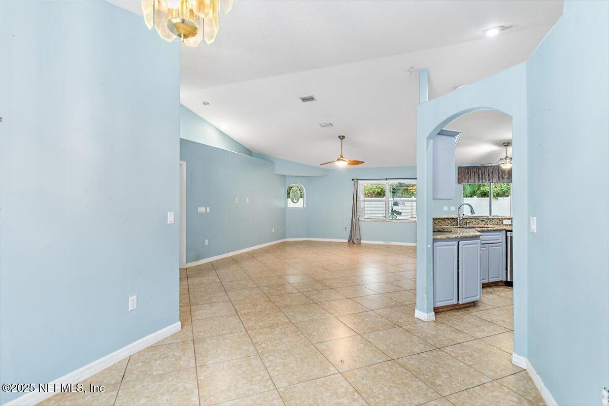 170 Secretary Trail Palm Coast, FL 32164 - Photo 5 of 22 05-Dining to Living Room