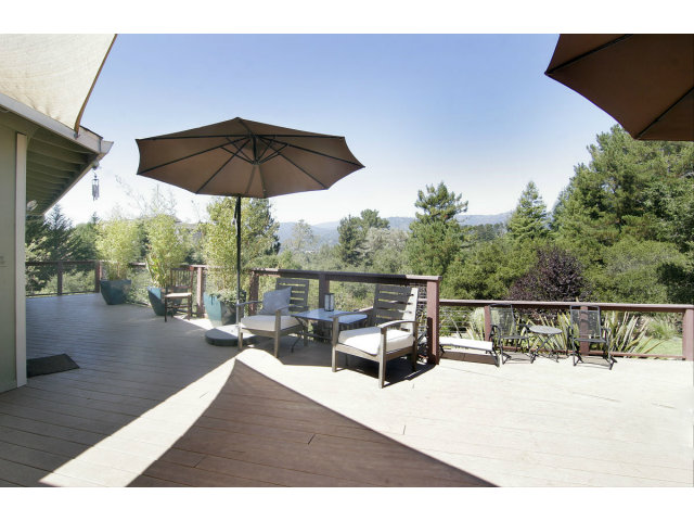 455 Poppy Hill Road Watsonville, CA 95076 - Photo 14 of 25 a view of a roof deck with furniture