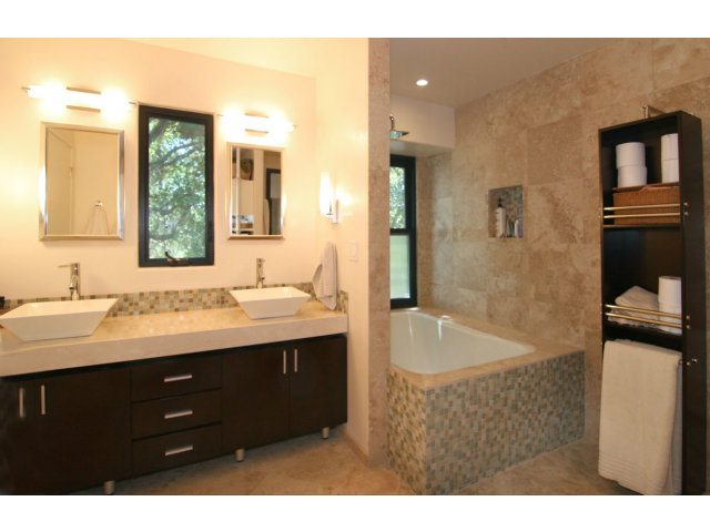 455 Poppy Hill Road Watsonville, CA 95076 - Photo 15 of 25 a bathroom with a sink double vanity granite tub shower and a mirror