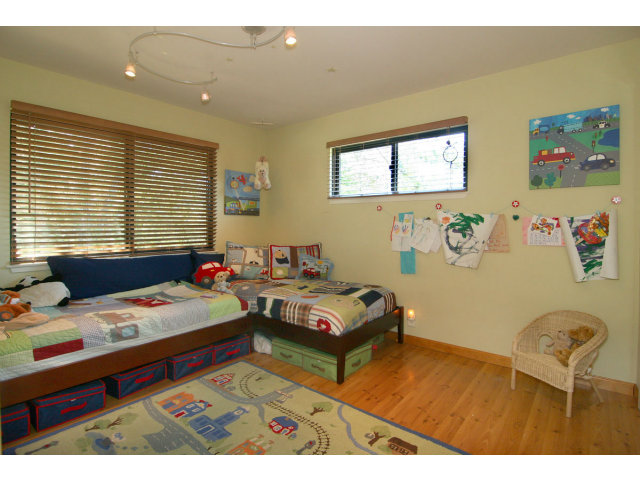 455 Poppy Hill Road Watsonville, CA 95076 - Photo 16 of 25 a bedroom with furniture and a window
