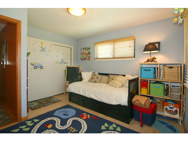 455 Poppy Hill Road Watsonville, CA 95076 - Photo 17 of 25 a bedroom with a bed and a dresser