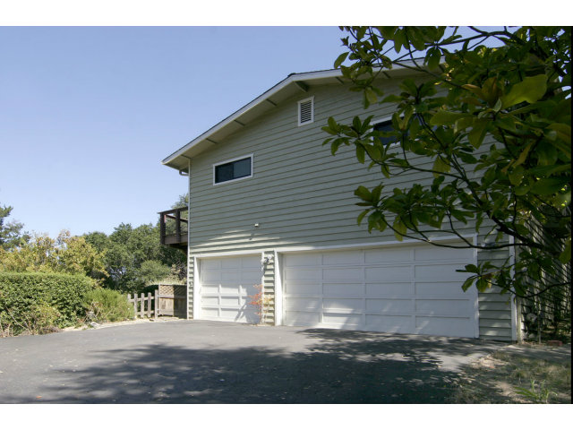 455 Poppy Hill Road Watsonville, CA 95076 - Photo 24 of 25 a front view of a house with a yard