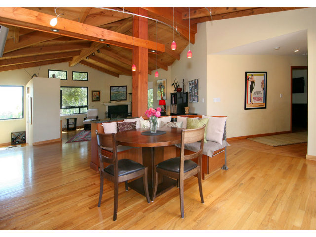 455 Poppy Hill Road Watsonville, CA 95076 - Photo 9 of 25 a dining room with furniture and wooden floor