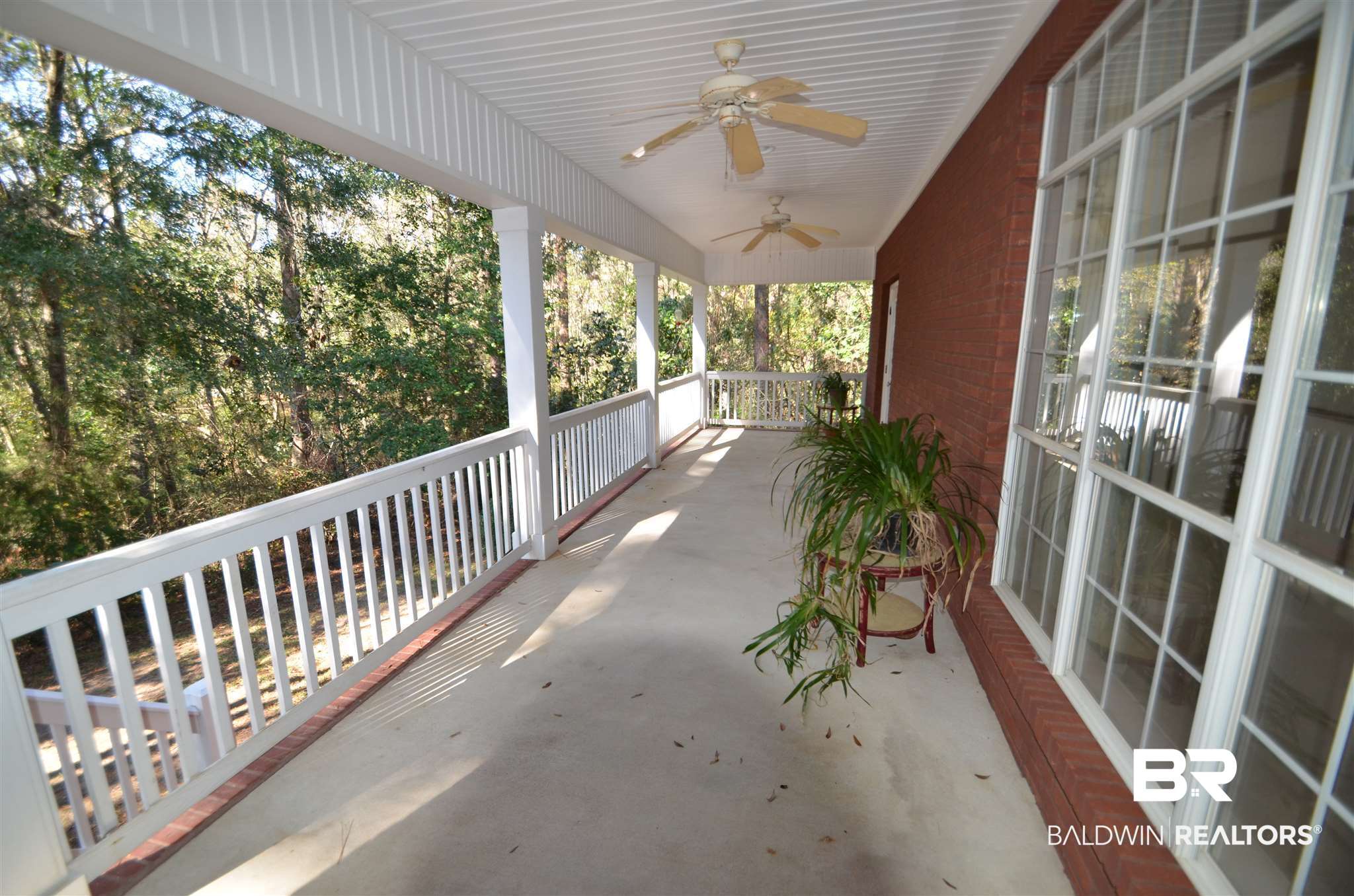 30432 Dolive Ridge Daphne, AL 36527 - Photo 42 of 47 Huge covered porch stretches along back of house!