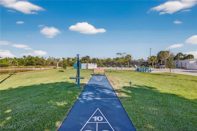 a view of a swimming pool with a patio
