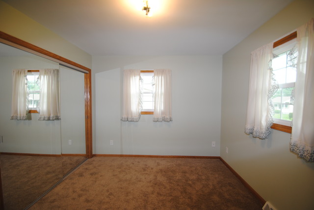 17676 Frazier Road Sandwich, IL 60548 - Photo 11 of 25 an empty room with windows
